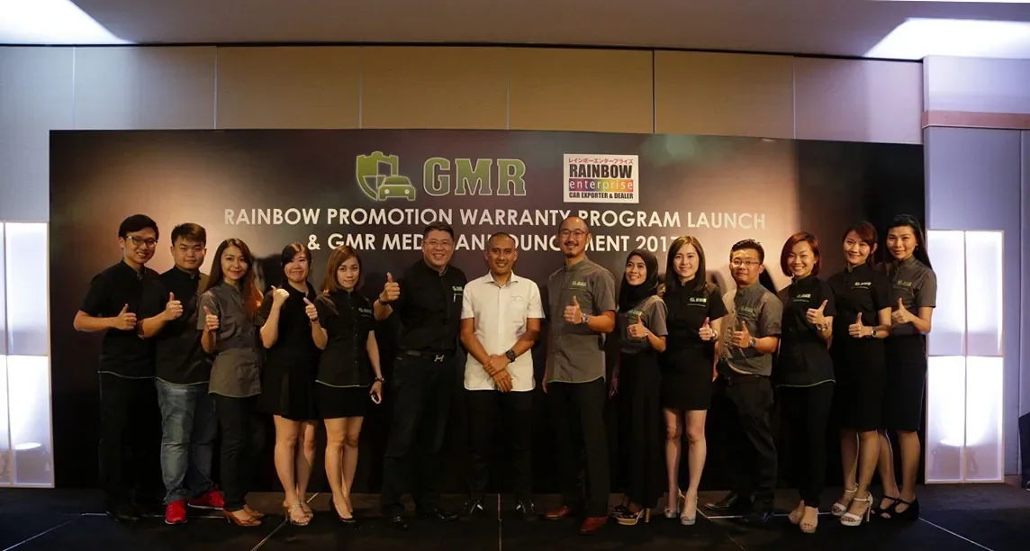 The Guard My Ride team on stage at a warranty programme launch